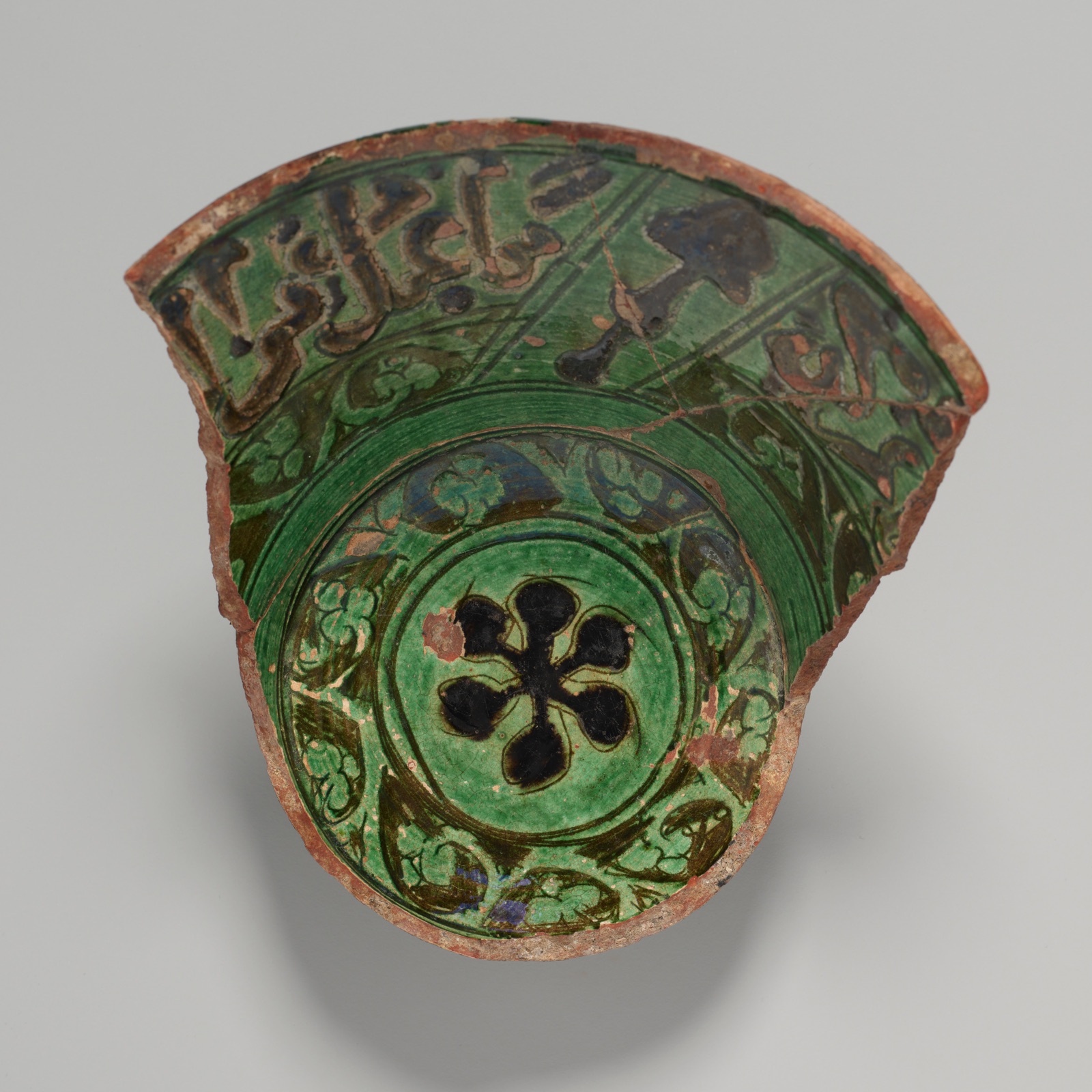 Bowl Fragment with Rosette Emblem — Islamic; Fustat (now Cairo), Egypt