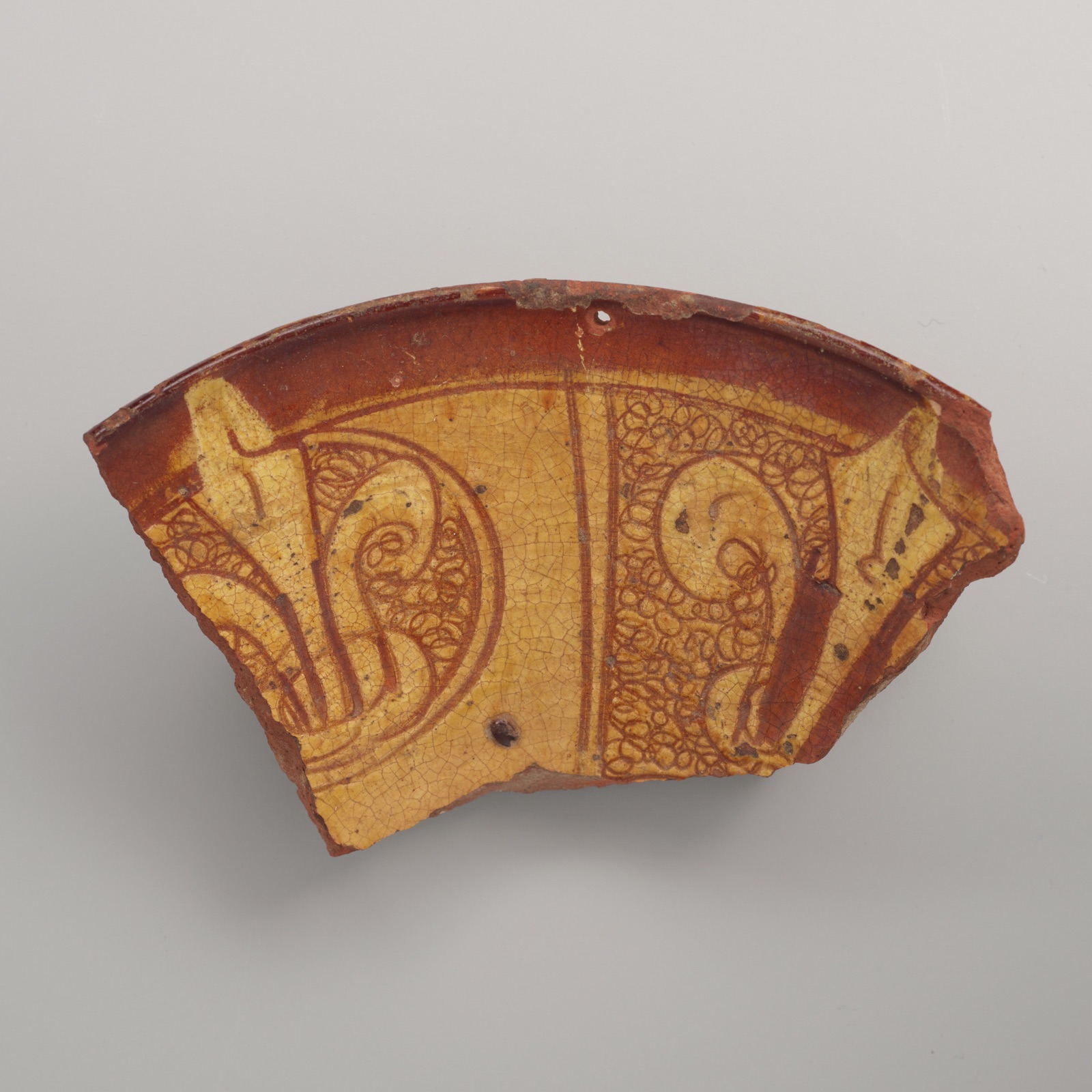 Vessel Fragment with Fleur-de-lis Emblems — Islamic; Fustat (now Cairo), Egypt