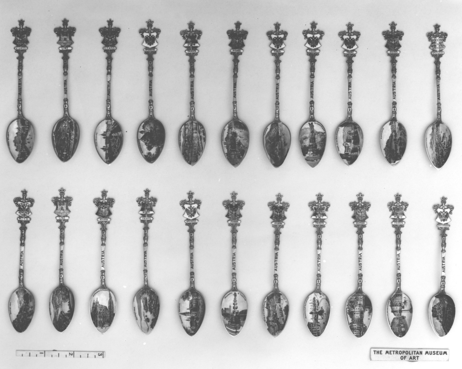 Souvenir spoon with view of Trieste harbor and customs house with monument to the Emperor Maximilian
