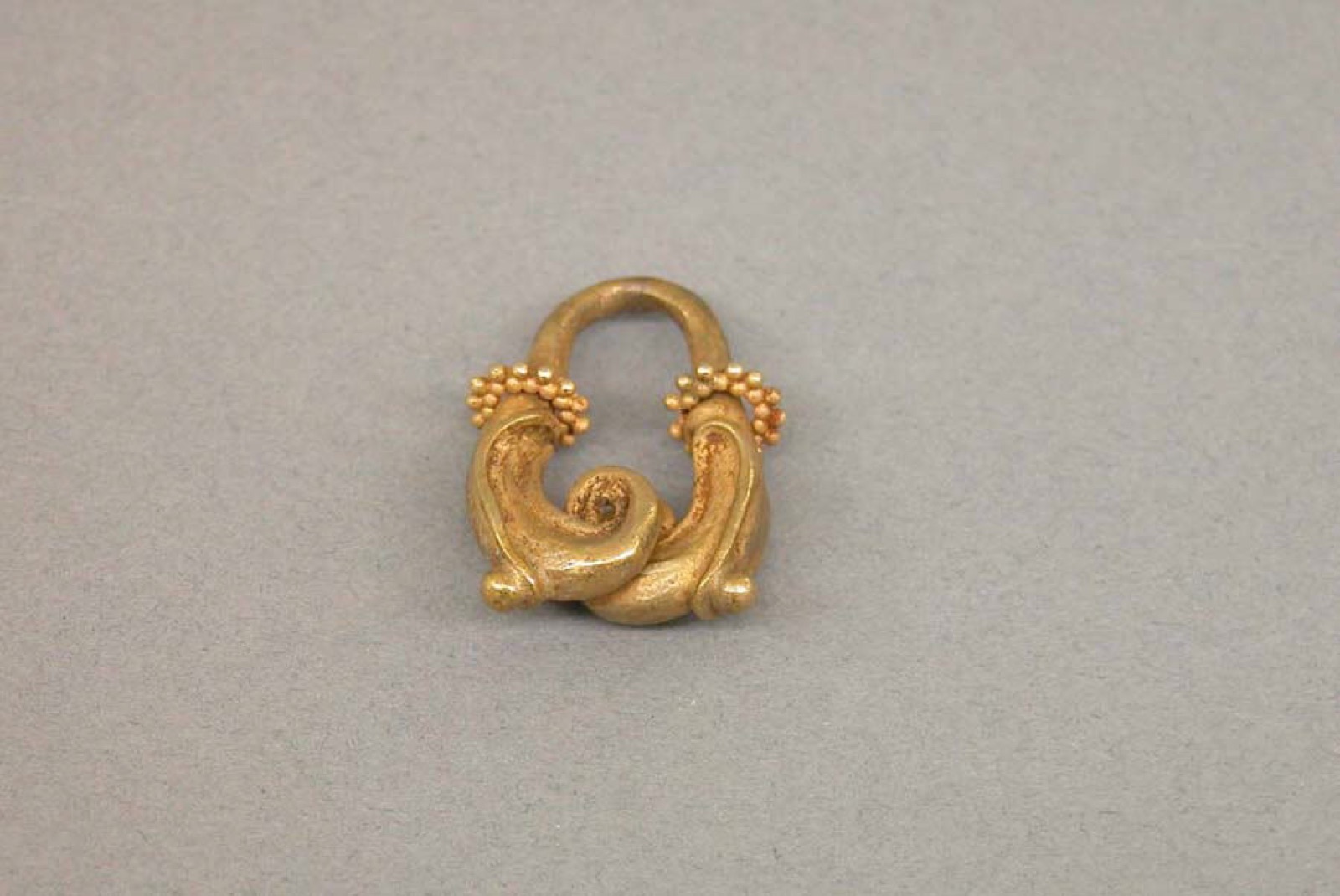 Ear Ornament with Granulate Design and Foliate Motif