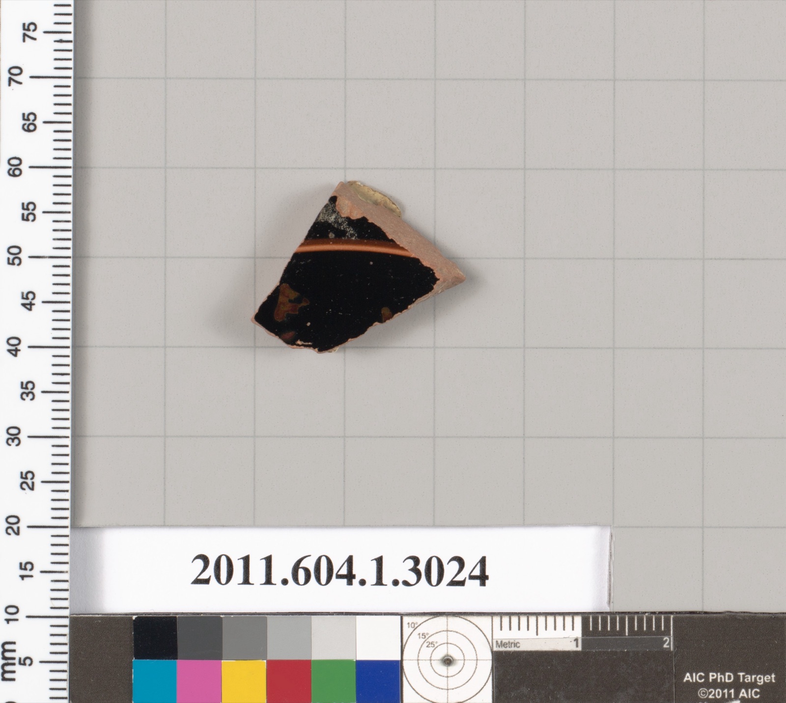 Terracotta fragment of a kylix (drinking cup)
