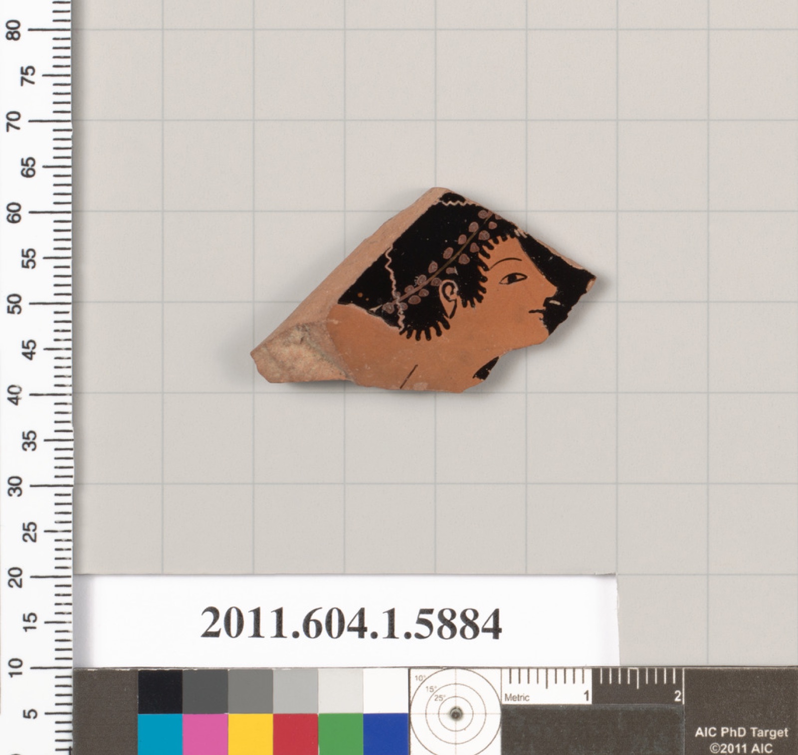 Terracotta fragment of a kylix (drinking cup)