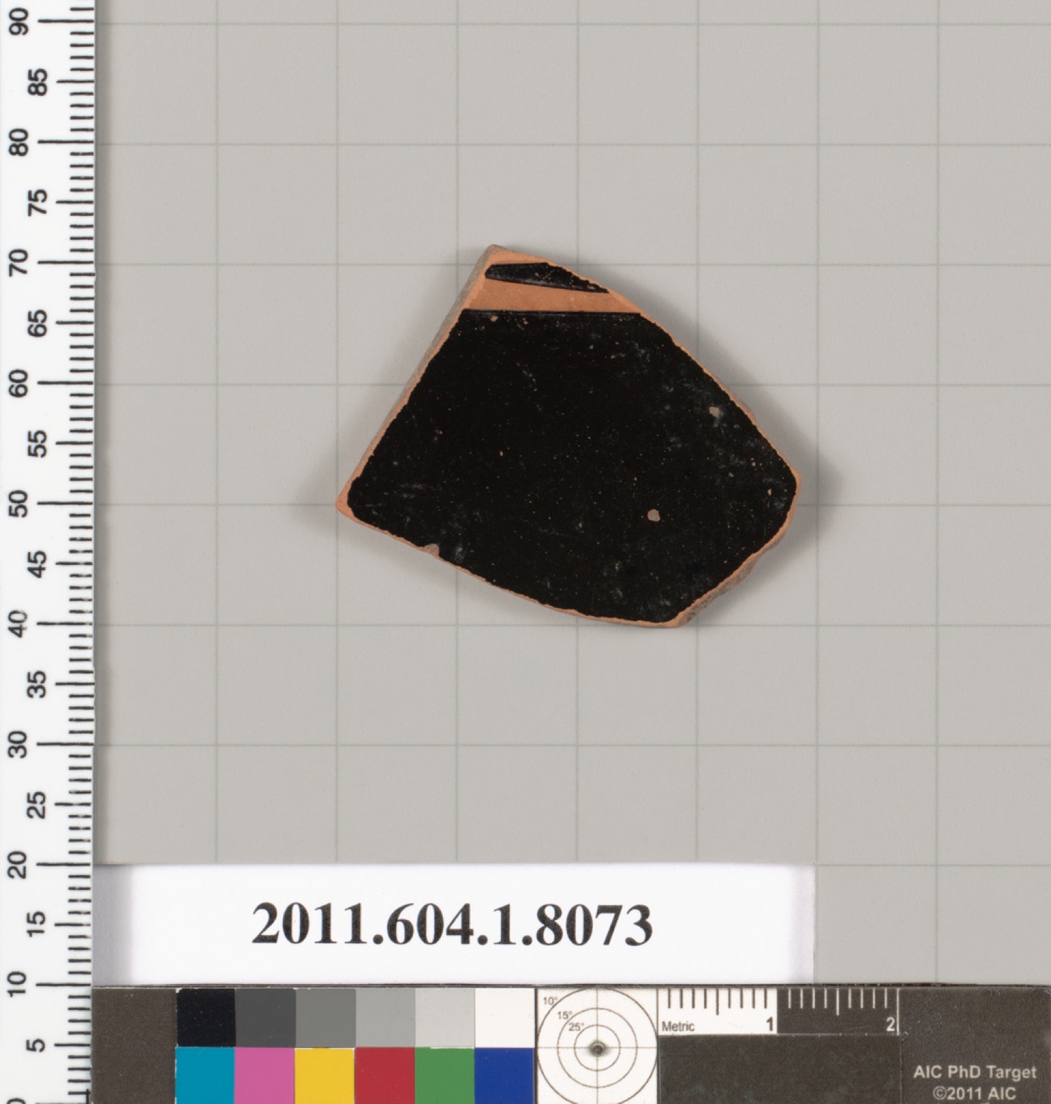 Terracotta fragment of a kylix (drinking cup)