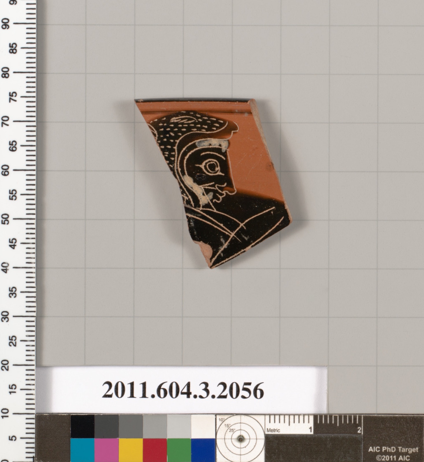 Terracotta rim fragment of a kylix (drinking cup)
