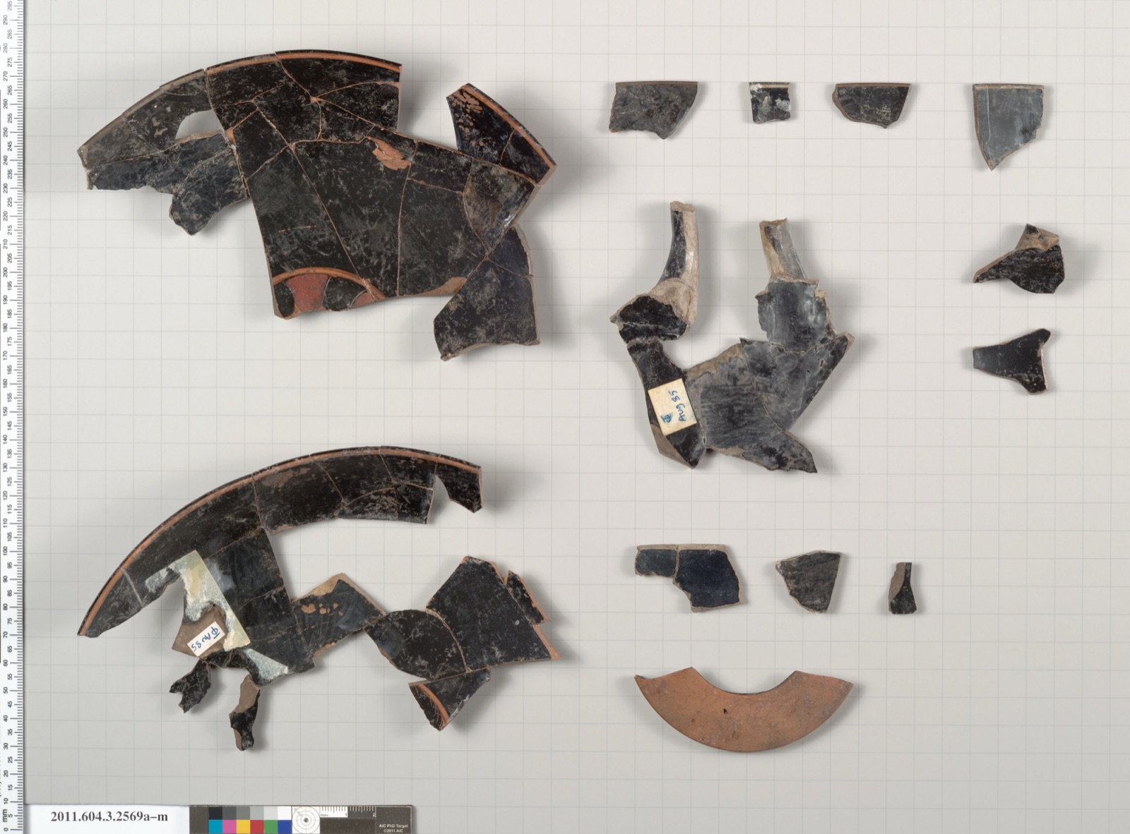 Terracotta fragments of a kylix: eye-cup (drinking cup)
