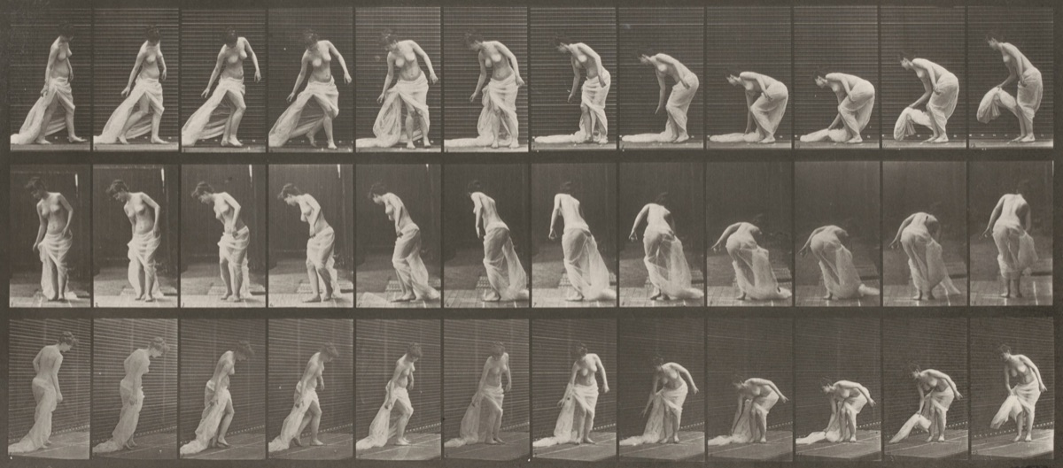Plate Number 232. Stooping to lift train and turning — Eadweard Muybridge