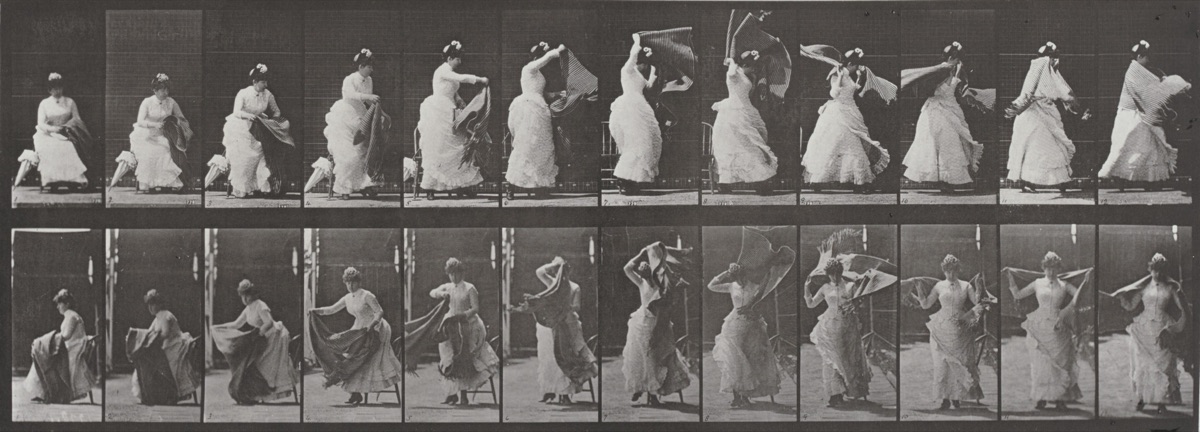 Plate Number 424. Toilet, rising from chair and putting on shawl — Eadweard Muybridge