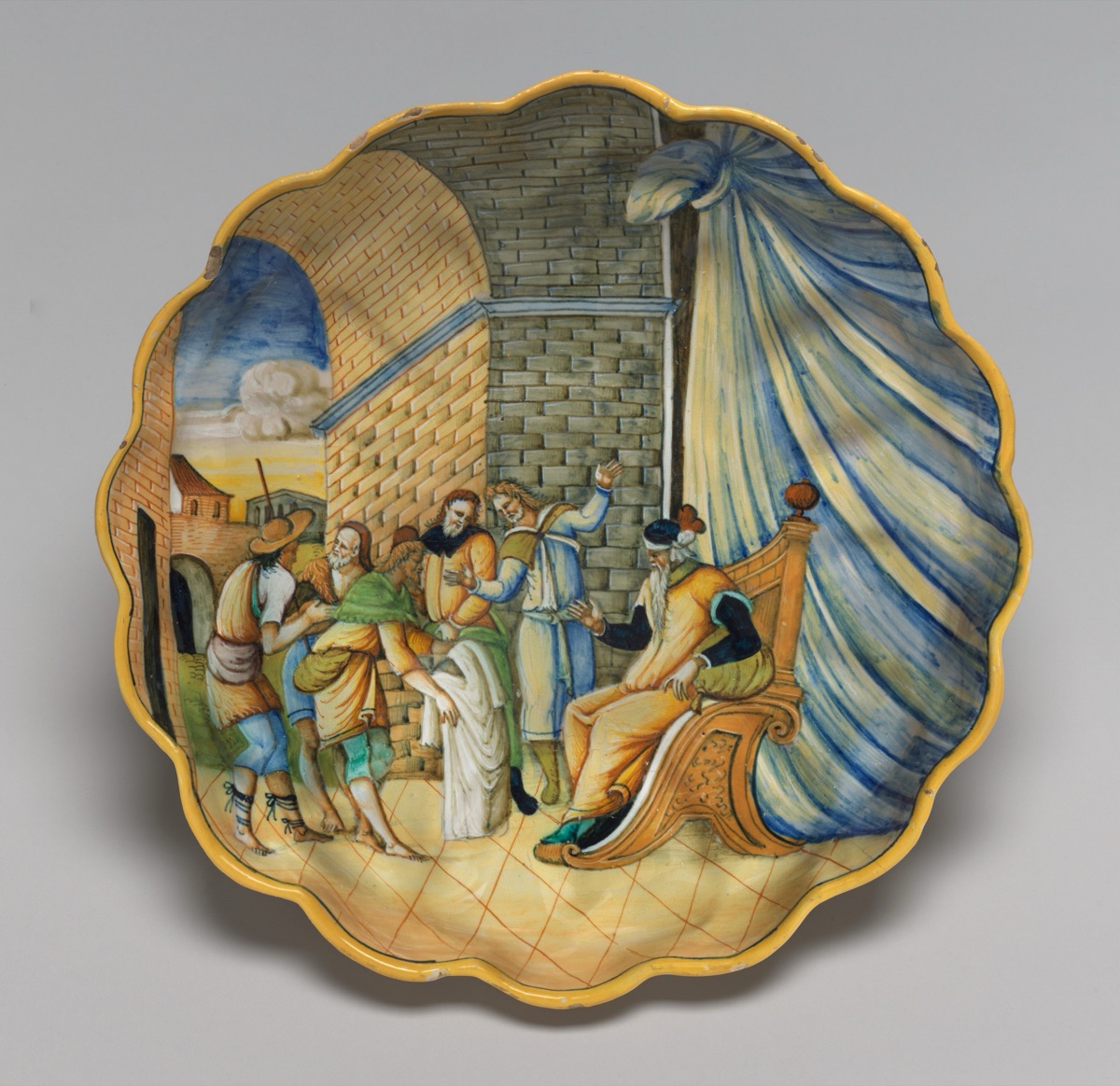 Molded dish with Joseph's robe being presented to his father — Urbino 16th Century; Lyon 16th Century; Urbino or possibly Lyon 16th Century